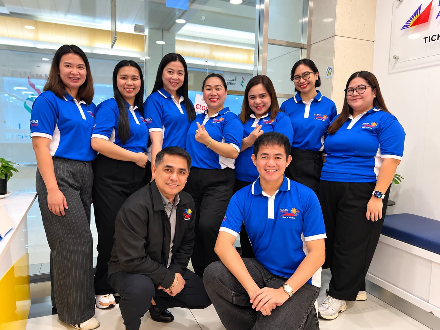 The Pinas Travel team at our Reef Mall branch in Deira, Dubai